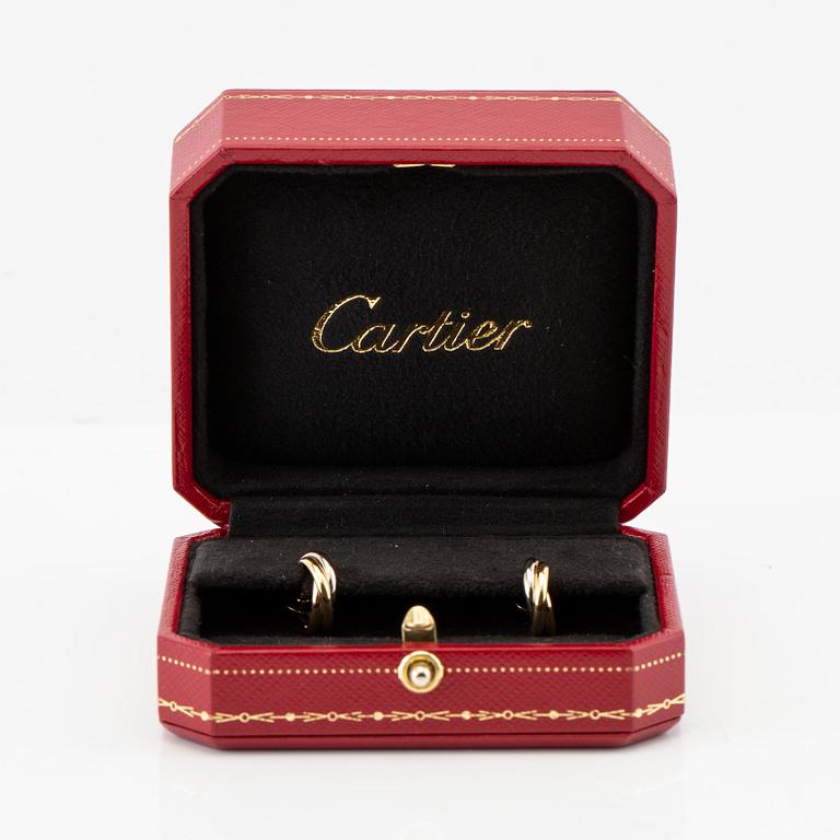 Cartier, a pair of "Trinity" earrings in 18K red, white, and rose gold.