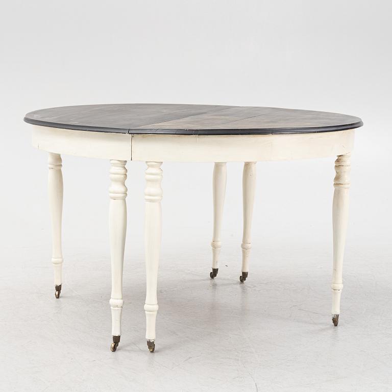 A painted dining table, late 19th Century.