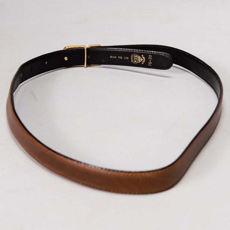 GUCCI Silk Blouse and a Leather Belt.