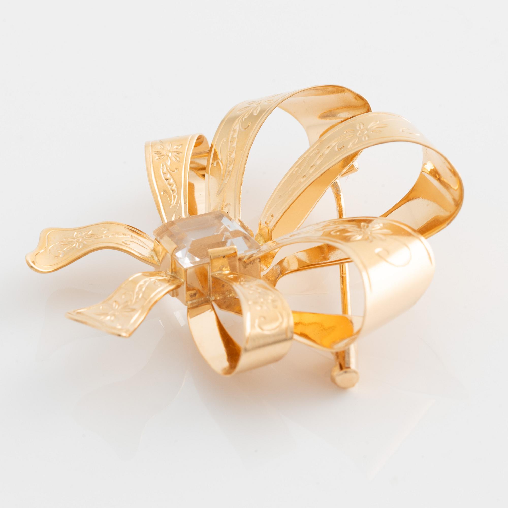 Stigbert, brosch 18K guld med bergkristall.