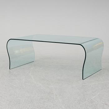 A mid 20th Century glass coffee table.