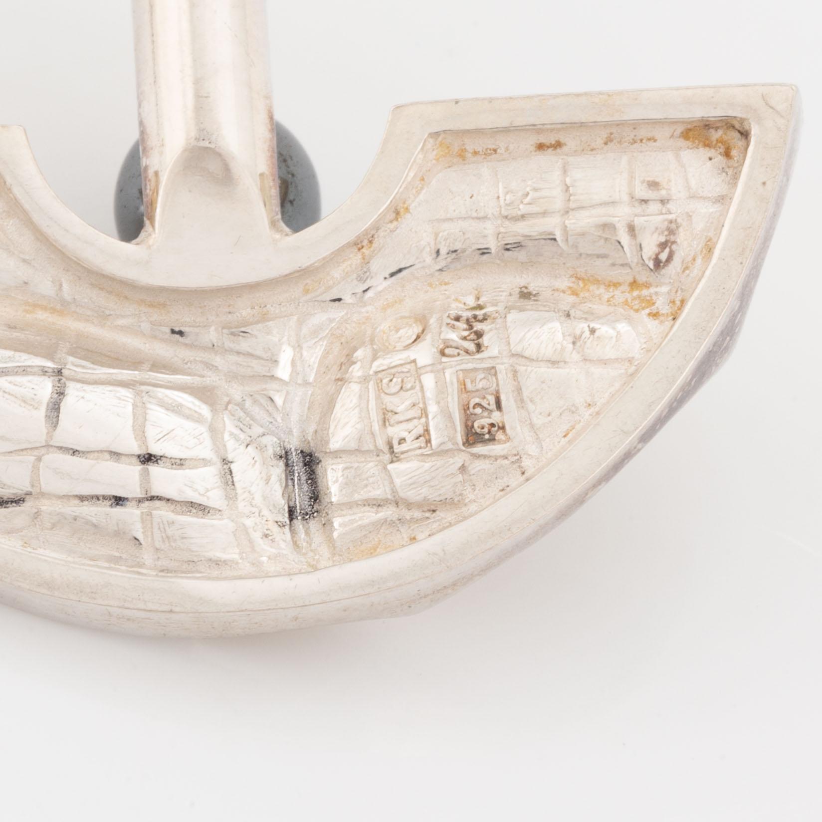 Rolf Karlsson a silver and hematite pendant.