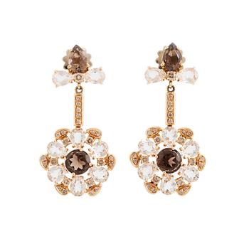 482. A pair of 18K gold earrings set with smoky quartz, rock crystal and round brilliant-cut diamonds.