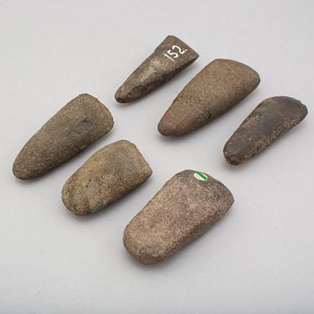Six neolithic stone axes.