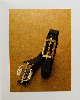 A lot of 4 books regarding watches.