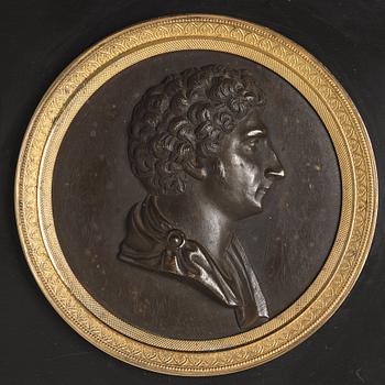 A Swedish Empire portrait medallion representing Karl XIV Johan as Crown Prince, beginning 19th century.