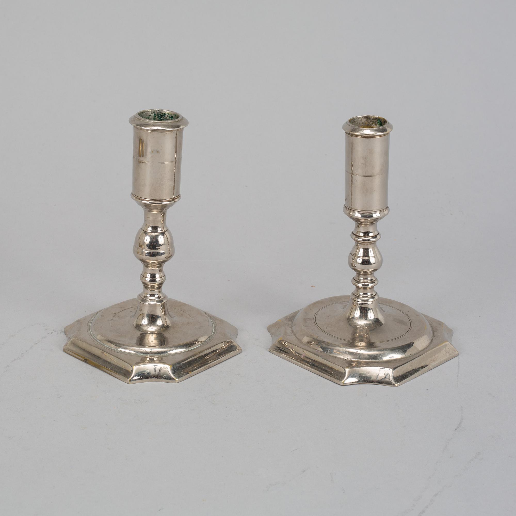 Two Swedish 18th century candlesticks.