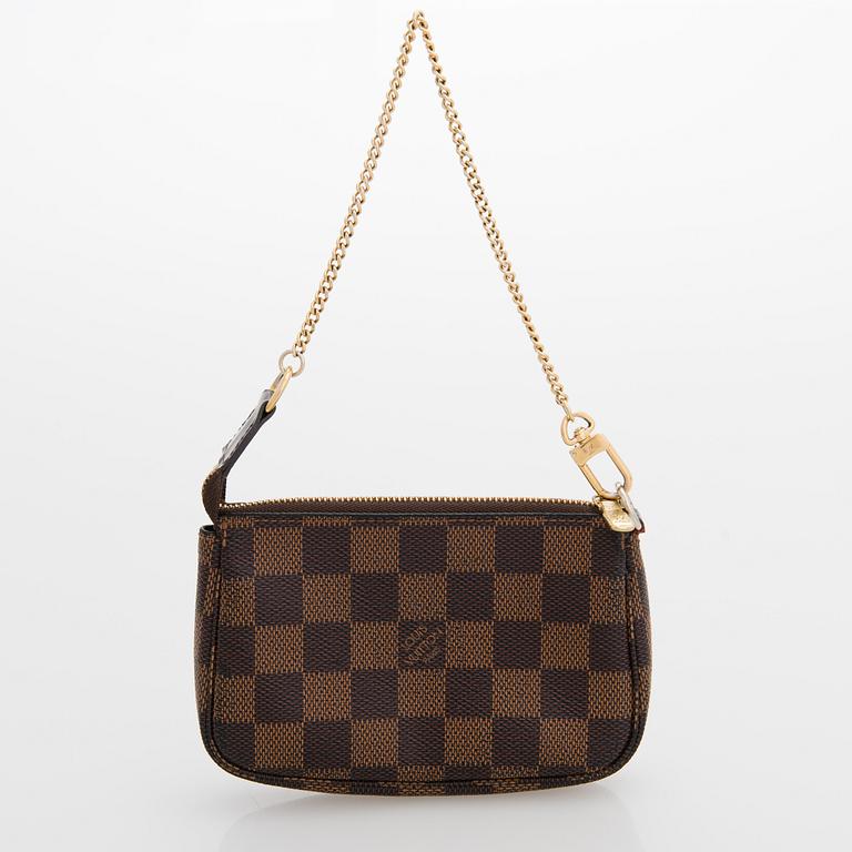 Louis Vuitton, "Neverfull GM" laukku samt pochette.