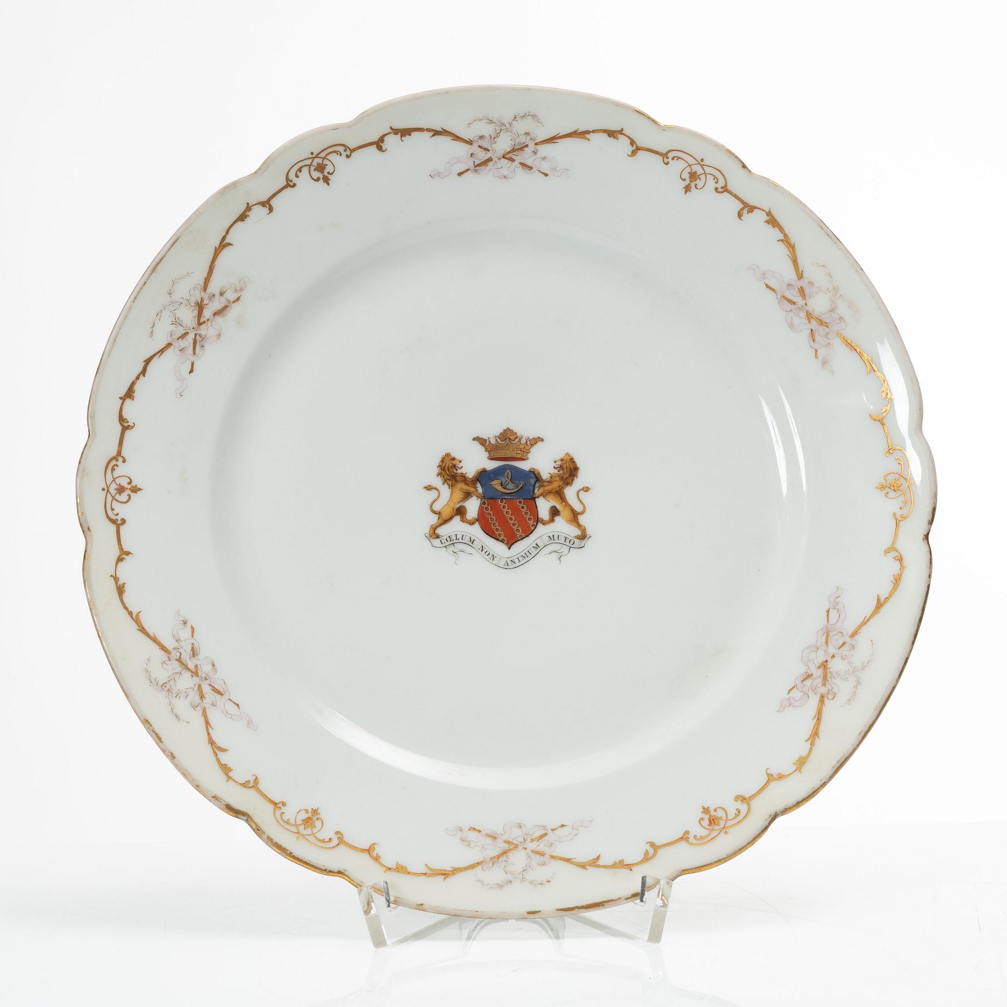 A group of three armorial dinner plates, presumably France, late 19th century.