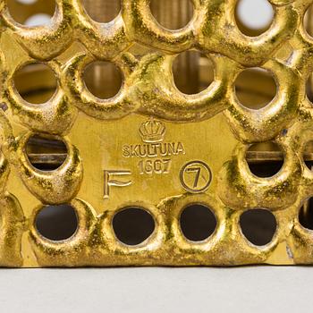 a brass ceiling light by Pierre Forsell for Skultuna.