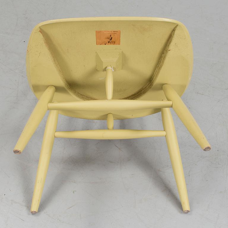 A chair by ILMARI TAPIOVAARA, "Mademoiselle" Edsbyverken, Sweden, 20 th century.
