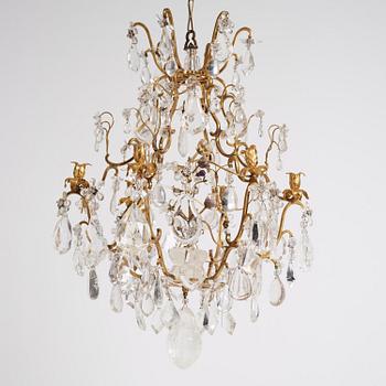 A French Louis XV-style six-branch gilt-bronze, rock crystal and amethyst chandelier, 19th century.