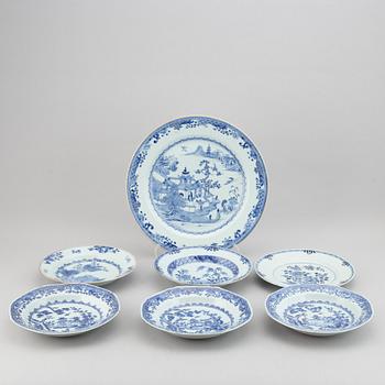 A blue and white serving dish and six odd blue and white plates, Qing dynasty, Qianlong (1736-95).