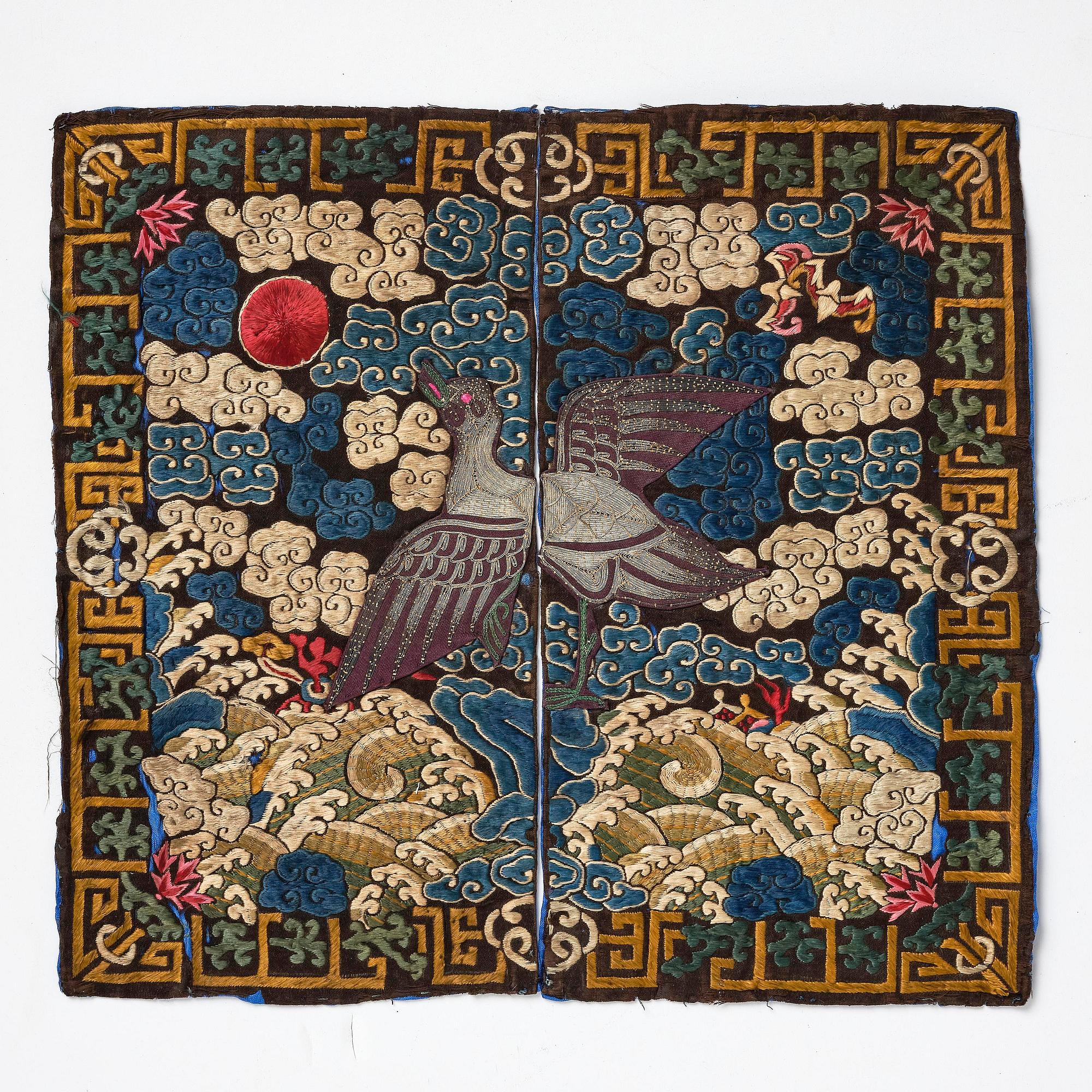 A pair of embroidered civil officials rank badges, Buzi, with egrets, Qing dynasty, 19th century.