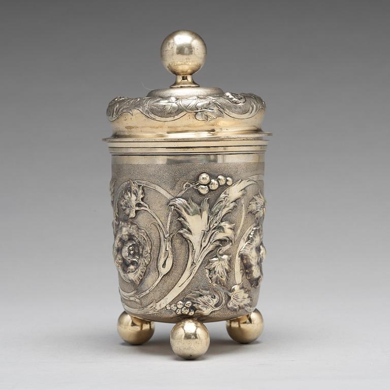 A Russian 19th century parcel-gilt silver beaker and cover, Moscow 1857.