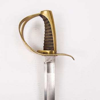 A Swedish cavalry sabre 1854 pattern with scabbard.