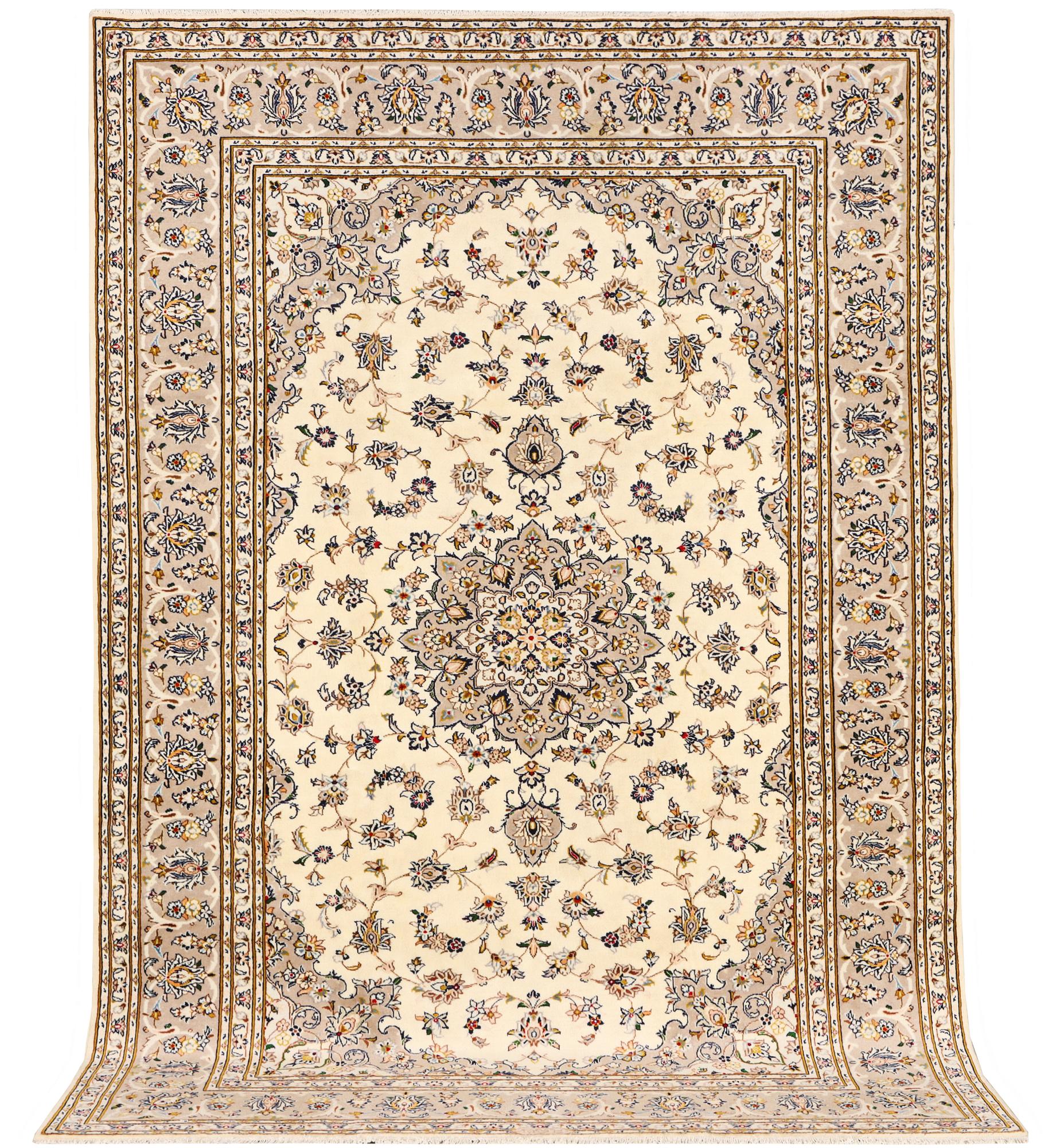 A Kashan carpet, c. 306 x 200 cm.