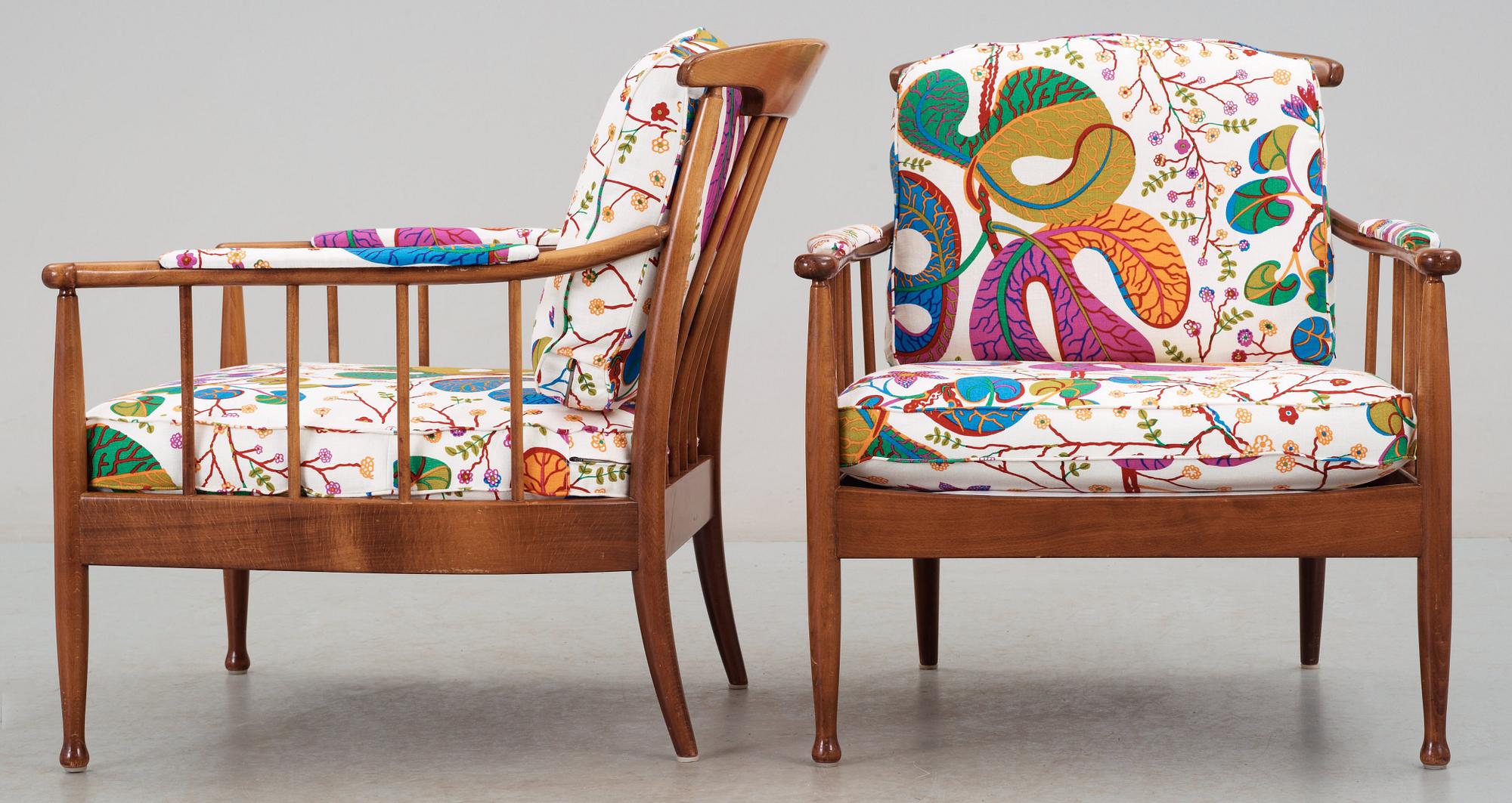 A pair of Kerstin Hörlin Holmquist mahogany arm chairs 'Skrindan', by OPE-möbler.