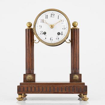 A classic style mantle clock, 19th century.