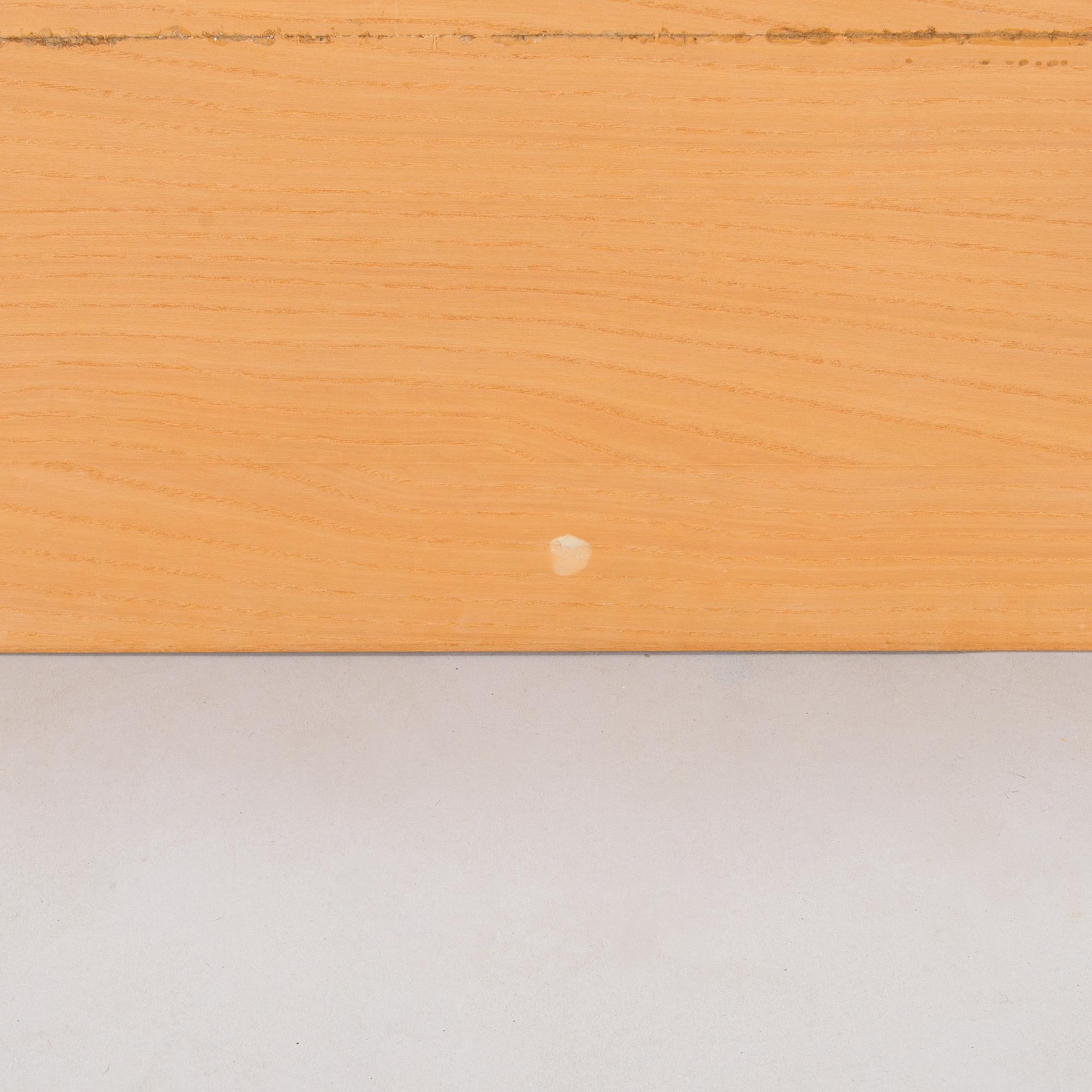 Alvar Aalto, a 1960s coffee table model MX800B, altered, for Artek.