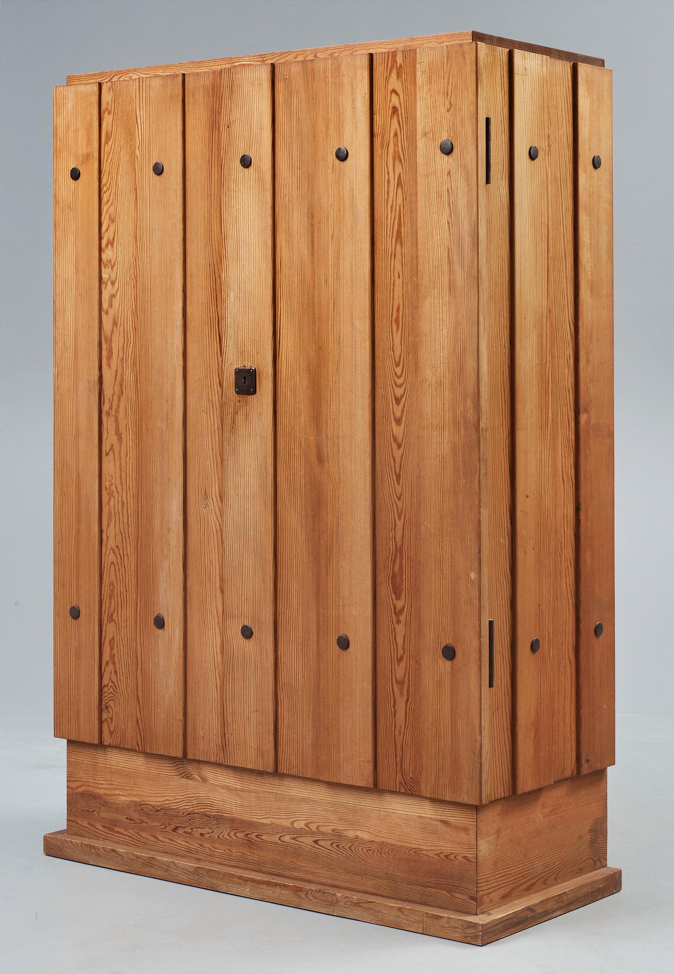 An Axel Einar Hjorth 'Lovö' stained pine cabinet, Nordiska Kompaniet, Sweden 1930's.