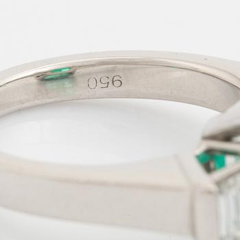 Emerald and trapezoid cut diamond ring.