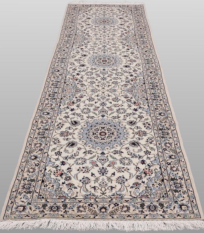 A Nain part silk runner carpet, 342 x 81 cm.