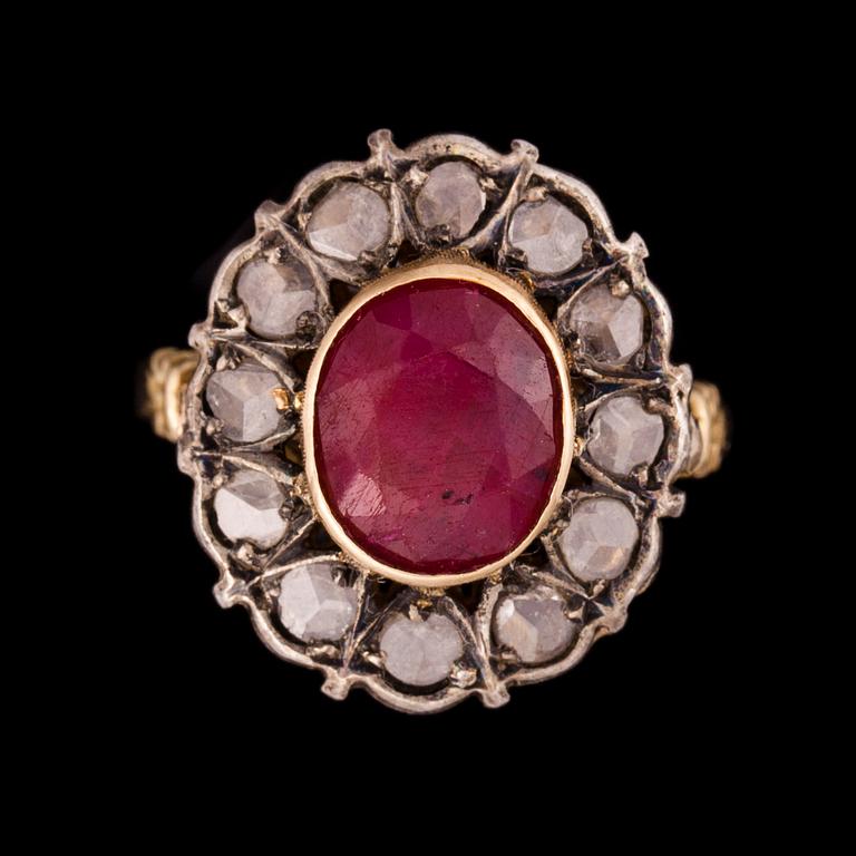 ARMSMYCKE samt RING, förgyllt silver, rubiner och polki diamanter. Vikt tot. 45 g.