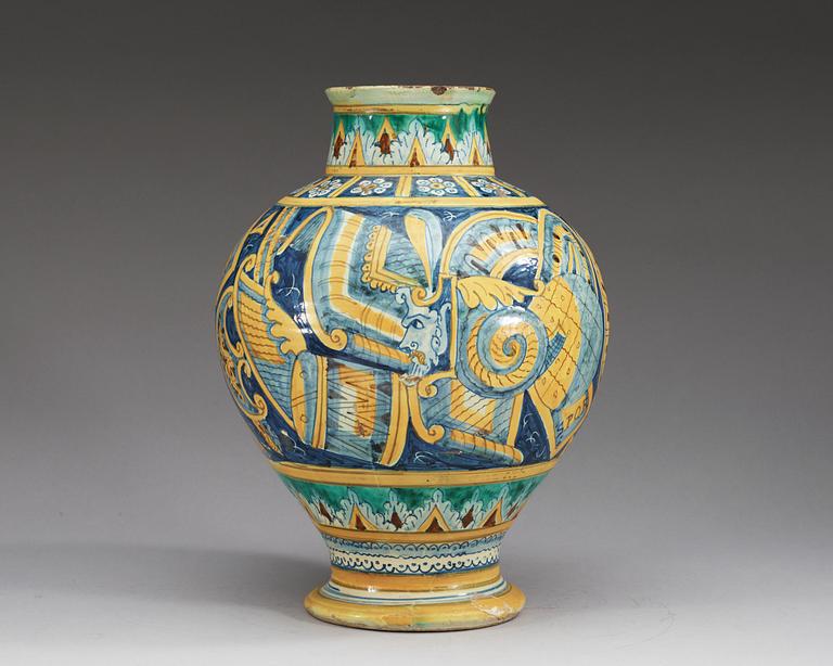 An Italian majolica albarello, presumably Urbino, 17/18th Century, marked with the date 1628.