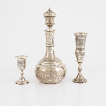 Six Silver Goblets, a Decanter, and a Champagne Goblet.