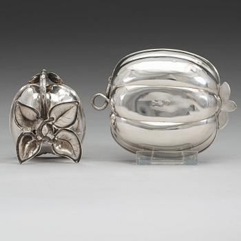 Two Russian mid 19th century parcel-gilt dishes, marked Carl Ekqvist, S:t Petersburg and unidentified maker, Moscow.