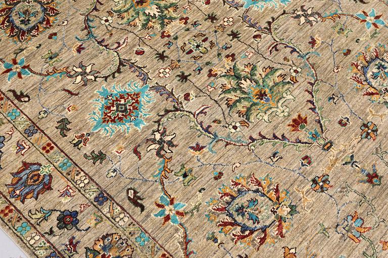 A rug, Zigler design, approx. 239 x 173 cm.