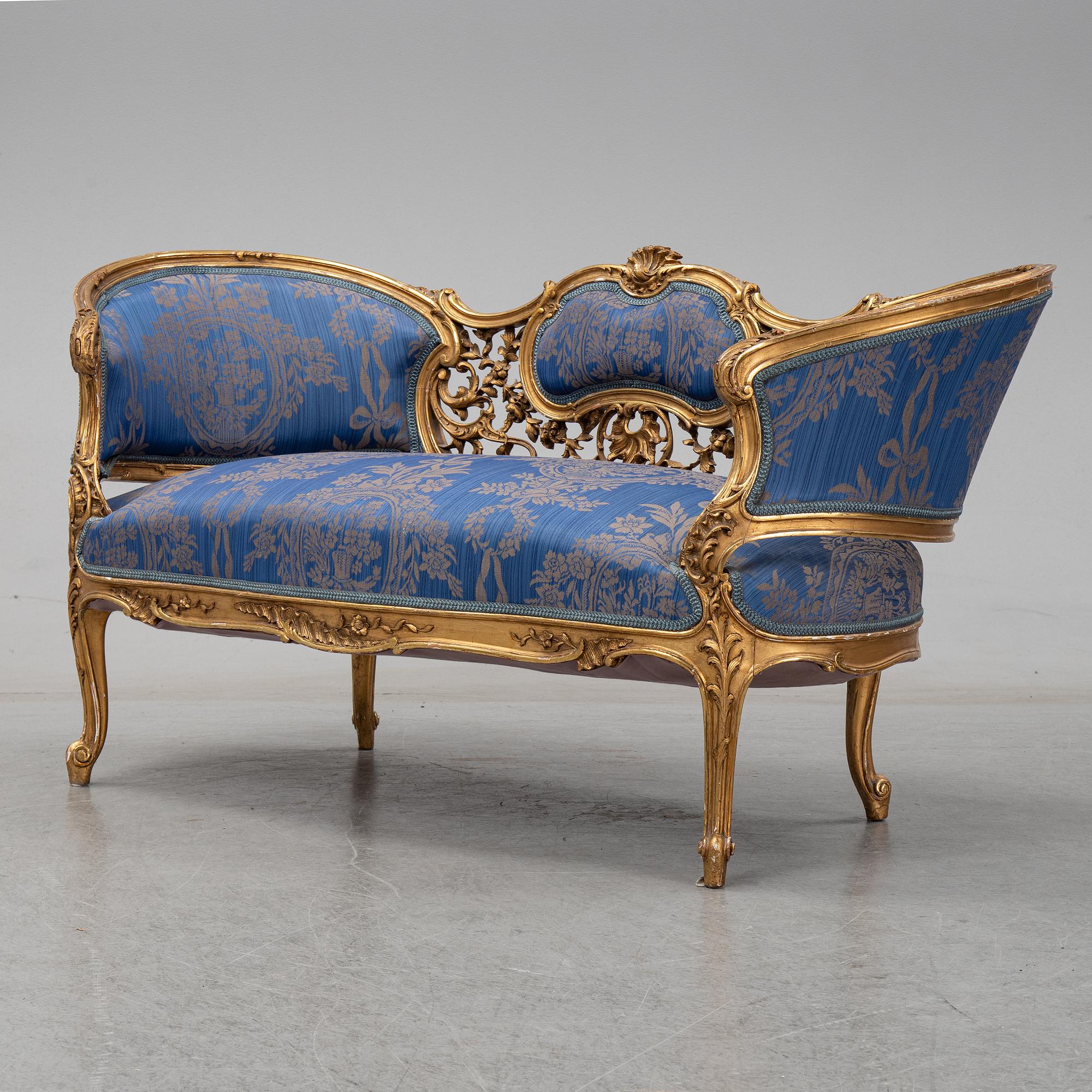 A Frennch 19th Century Louis XV style sofa.