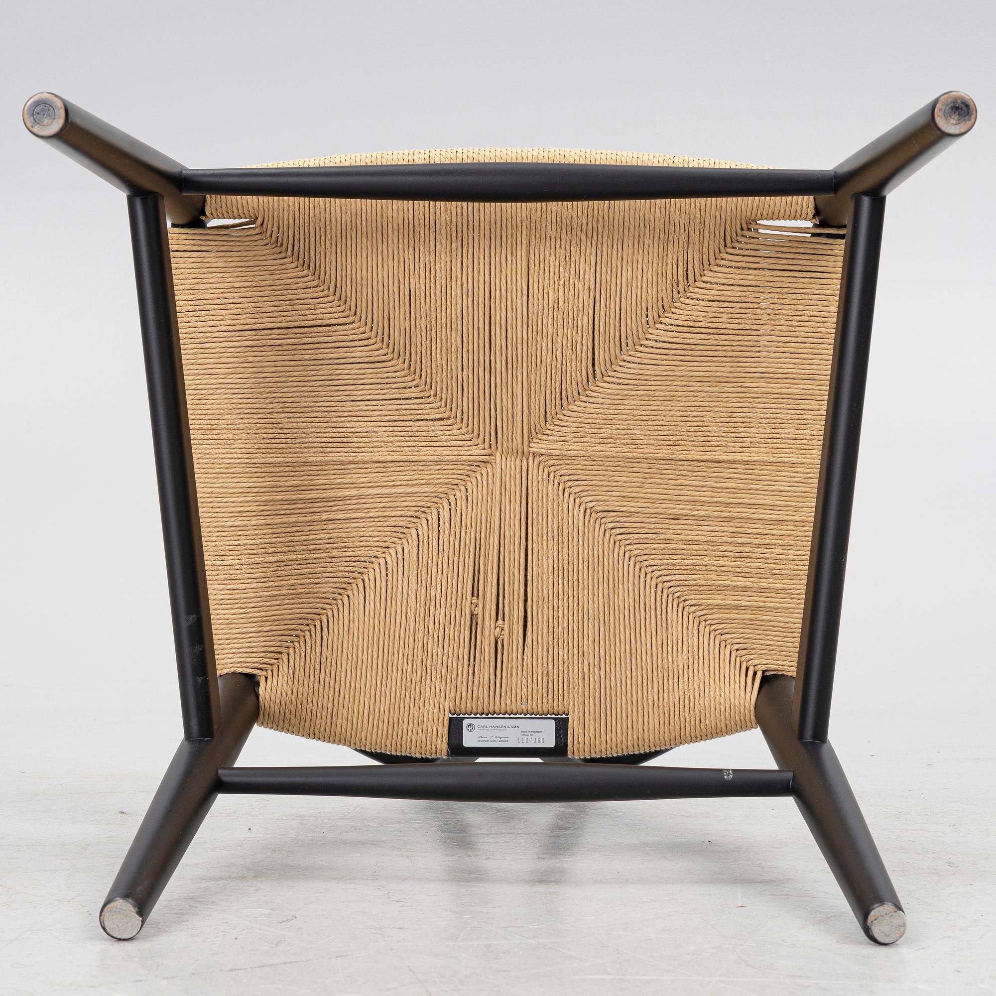 Hans J. Wegner, a model CH-24/'Wishbone' chair, Carl Hansen, Denmark, 21st century.