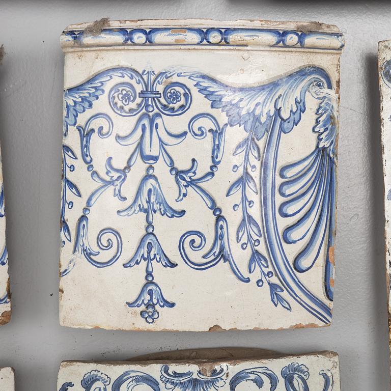 Eleven glazed earthenware tiles, 18th century.