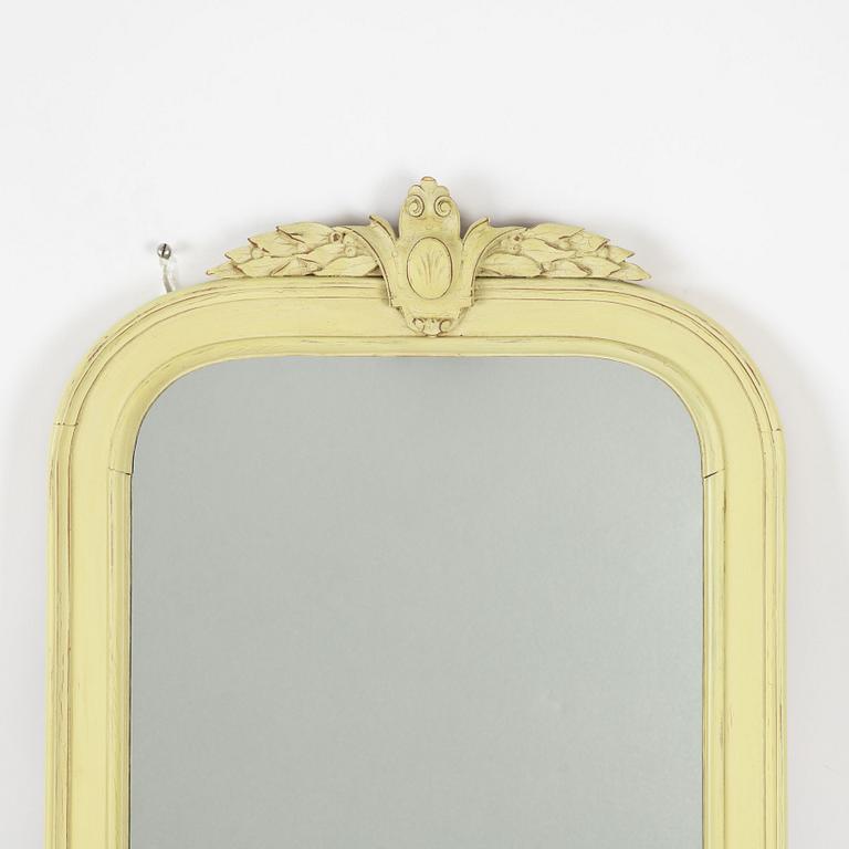 A mirror, circa 1900.
