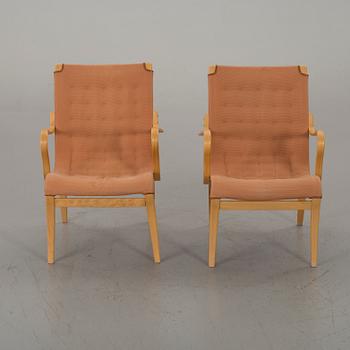 A PAIR OF BRUNO MATHSSON "MINA" ARMCHAIRS, Bruno Mathsson International.