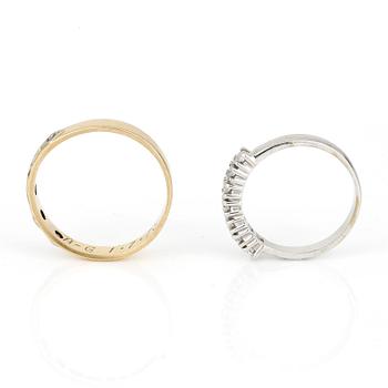 RINGAR, 2 st, med vita stenar, 18K guld.