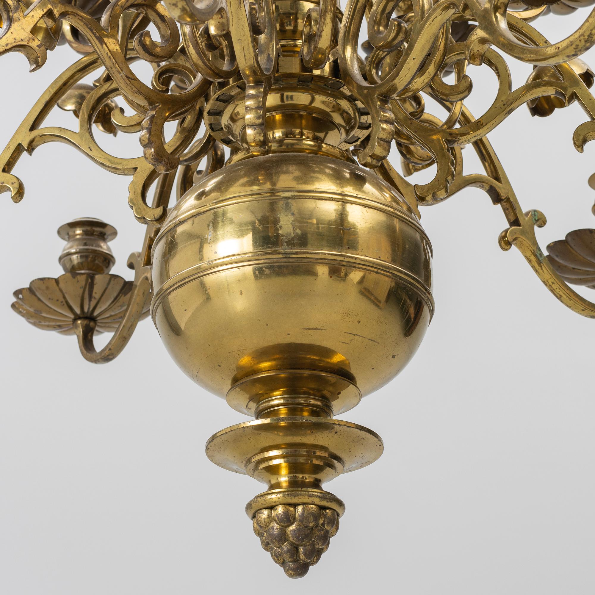 A Baroque style brass chandelier, 20th century.