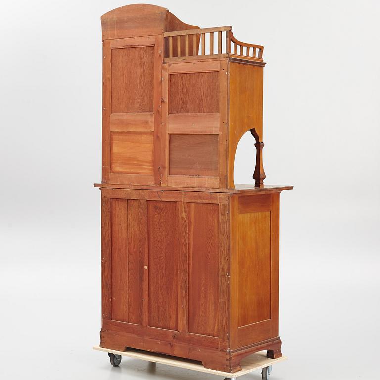 A cabinet, early 20th Century.