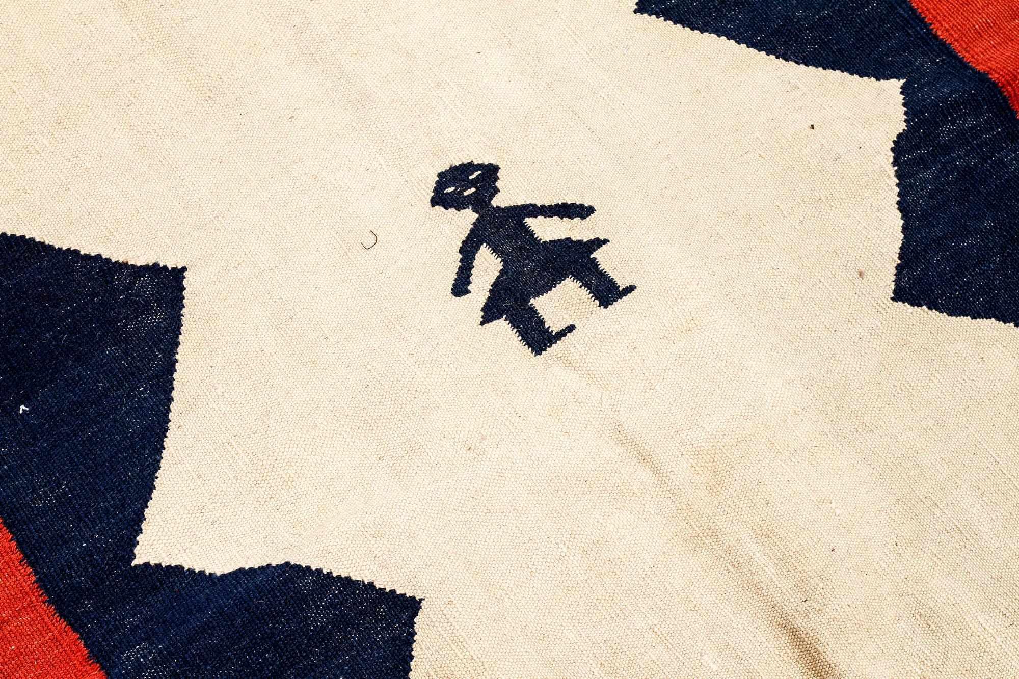 A KILIM RUG, 257 x 180 cm.