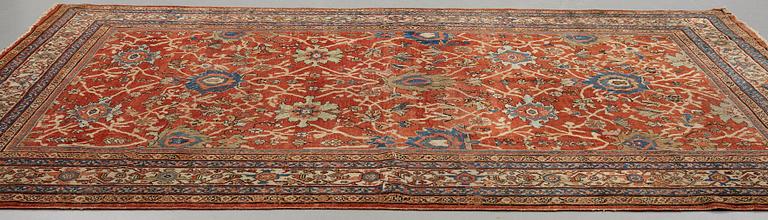 A carpet, an antique Mahal, Ziegler pattern, ca 371,5-374,5 x 265-266 cm (as well as a little flat weave at one end).