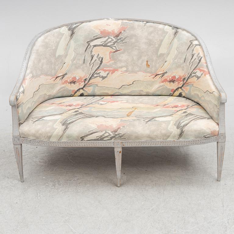 A late Gustavian sofa, early 19th century.