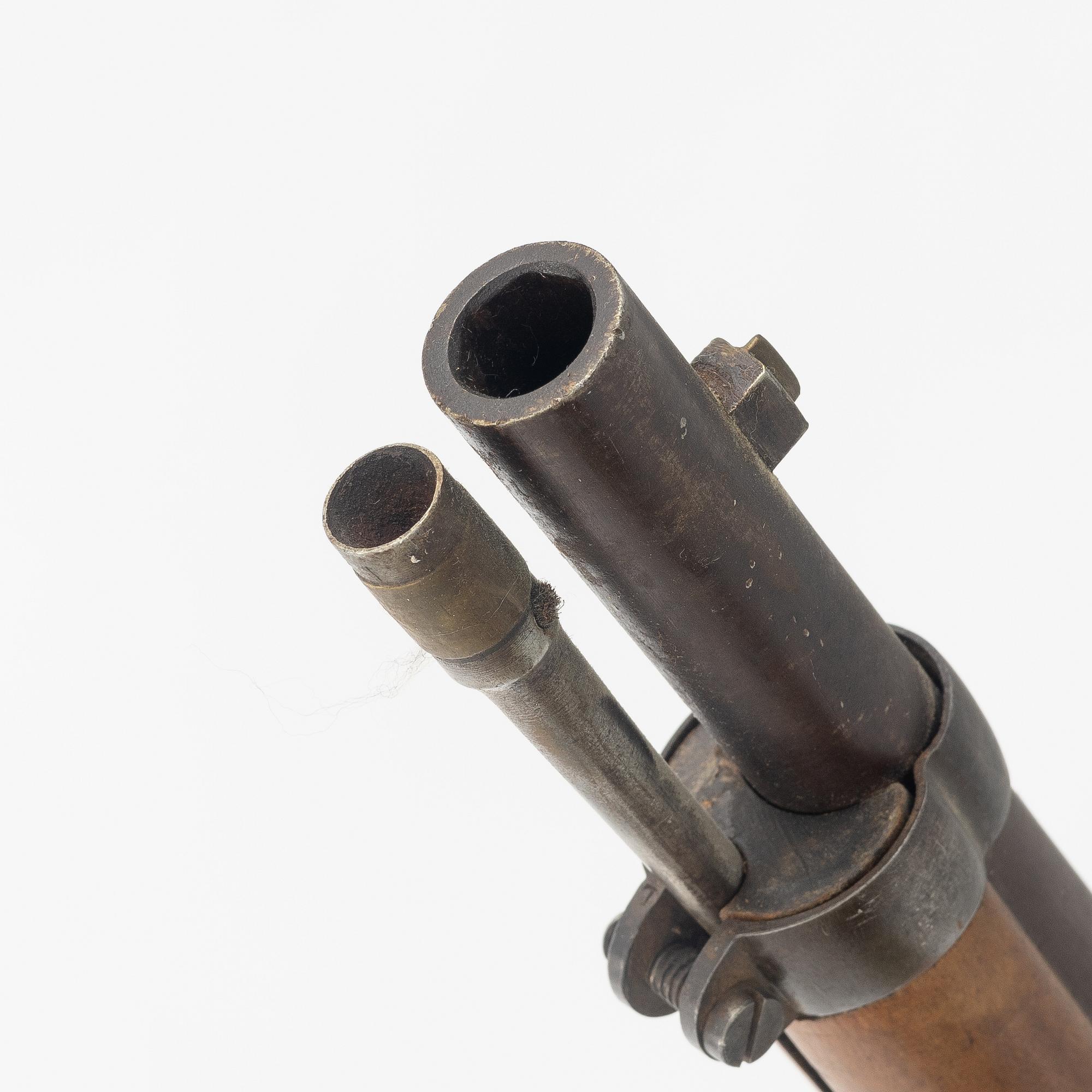 A Swedish 1860 pattern percussion rifle.