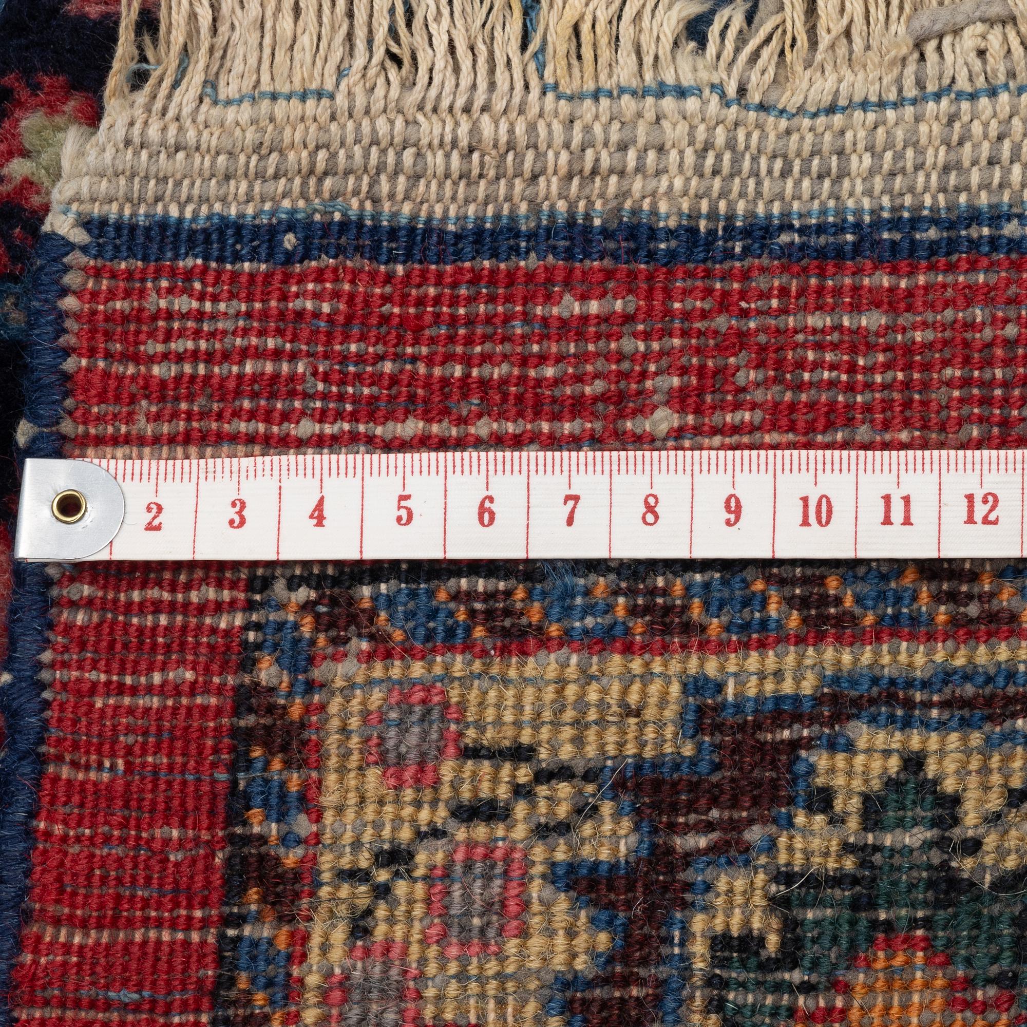 A semi-antique Mashad carpet, Eastern Iran, signed c. 507 x 303 cm.