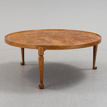 A Josef Frank walnut and burrled wood sofa table, Svenskt Tenn, model 2139.