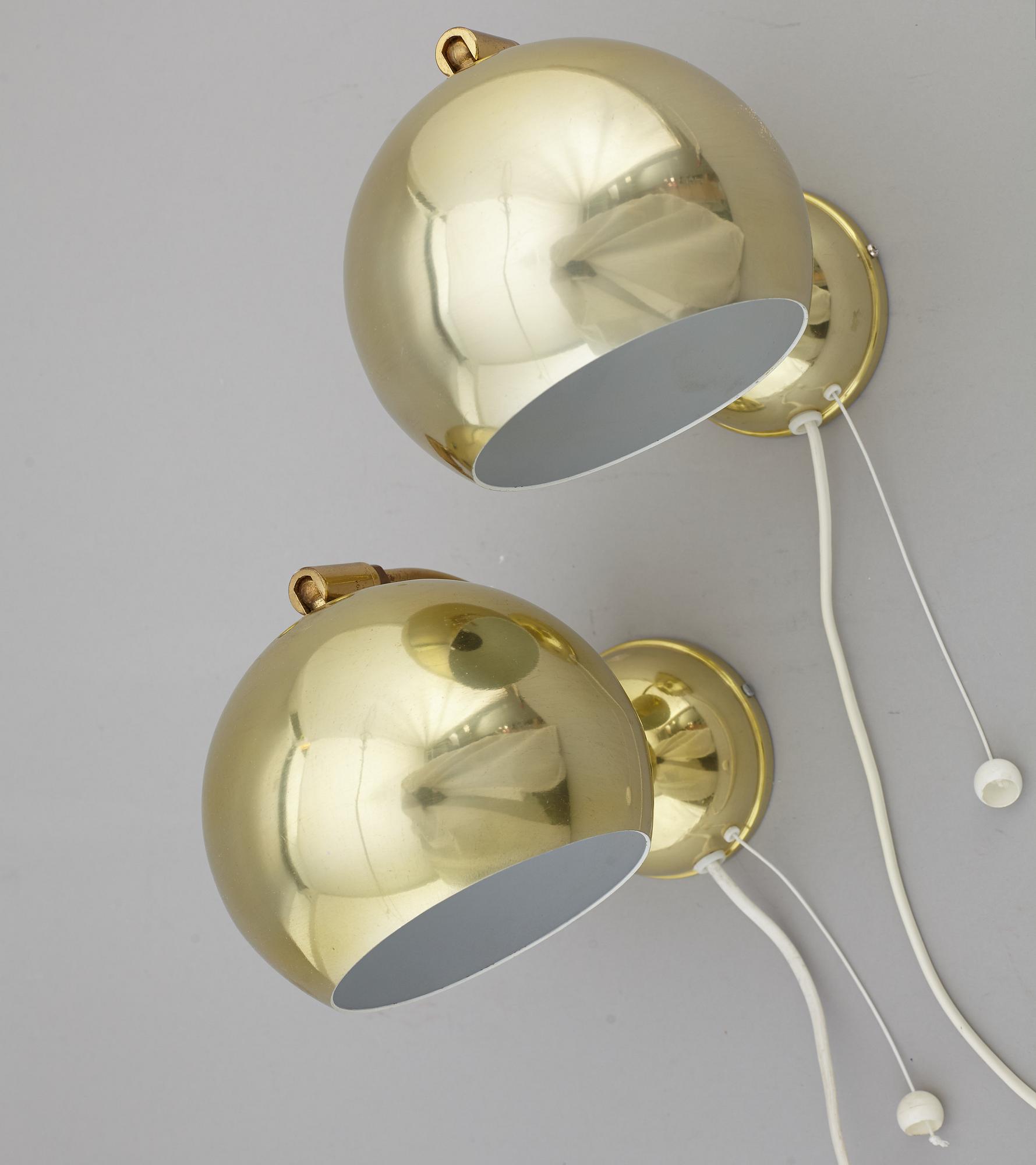 A pair of 1970's wall lamps.