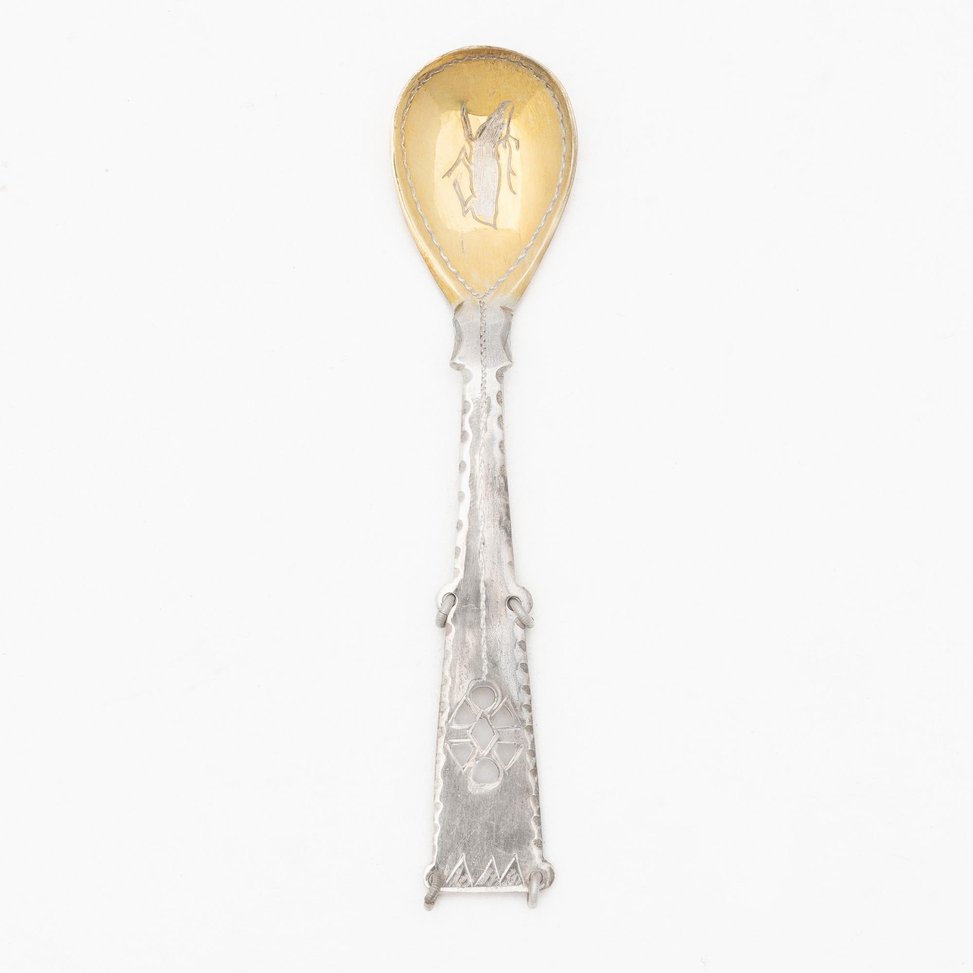 A set of twelve parcel gilt silver spoons, mark of Nya Guldsmedsaffären Göte Persson, Vilhelmina, Sweden 1946.