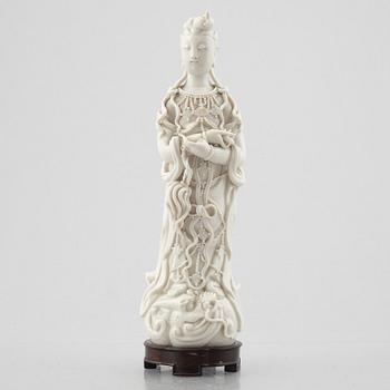 A Chinese blanc de Chine porcelain Guanyin figure, 20th century.