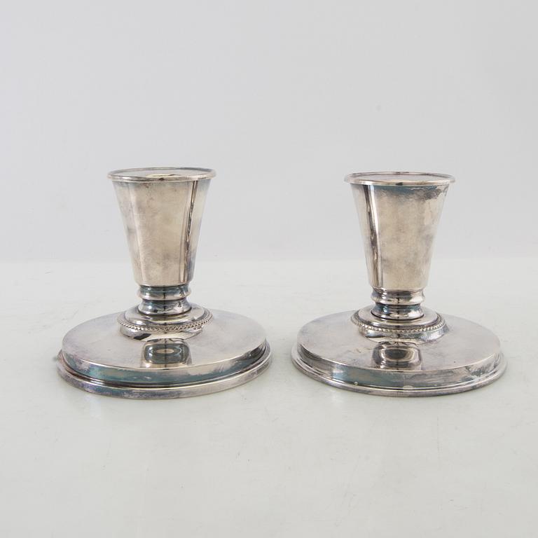 Candelsticks, a pair of silver-plated metal, first half of the 20th century.